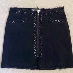 Bloomingdale’s black pistola mini skirt